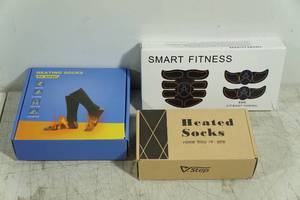 lot 226 image: Heated Socks and Muscle Toner
