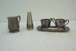 pewter and silver colored servingware