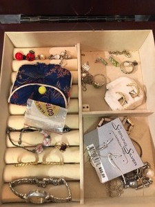 Jewelry Box contains various jewelry items