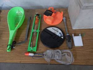 lot 6 image: 2-Tip Ups, 2-Slush Scoops, Minnow Nets, Spud Bar Head