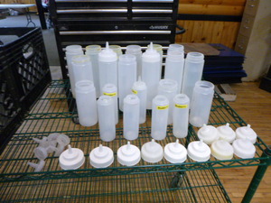 lot 52 image: Lot of Squirt Condiment Bottles