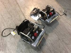 Lot 2 1 Gal. Portable Electric-Powered Silent Air Compressor by Husky Customer Returns See Pictures