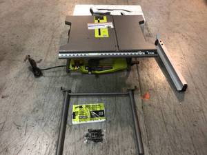 15 Amp 10 in. Table Saw with Folding Stand by RYOBI Customer Returns See Pictures