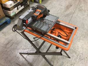 9 Amp Corded 7 in. Wet Tile Saw with Stand by RIDGID Customer Returns See Pictures