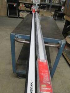 2 husky 84 inch metal tracks one is...