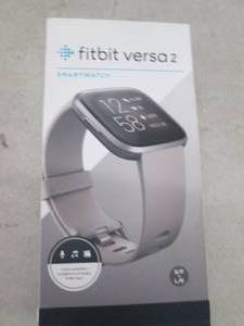 fit bit versa 2 powers on ...