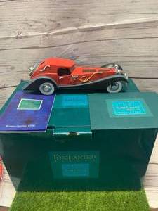 lot 12 image: Disney Enchanted Places 1996 Cruella Devilles Car (Sold $125 Ebay)