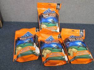 lot 81 image: 4- 11 oz bags Blue Buffalo Boo Bars...