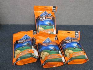 lot 82 image: 4- 11 oz bags Blue Buffalo Boo Bars...