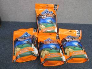 lot 84 image: 4- 11 oz bags Blue Buffalo Boo Bars...