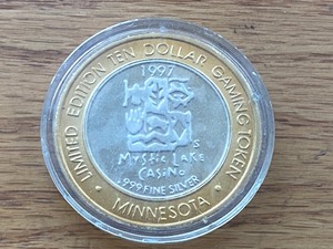 lot 7 image: 1997 .999-Fine Silver Strike 1975 C...