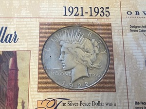 lot 27 image: 1922 Peace Silver Dollar Con In Dis...