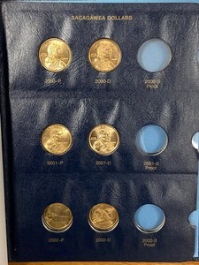 lot 56 image: Sacagawea Coin Album, Includes (6) ...