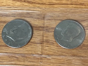 lot 58 image: (8) Different Date Kennedy Half Dol...