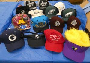Lot of 15 ball caps of various teams and logos