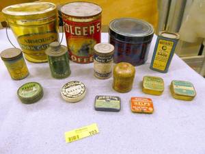 Group of vintage tins from pork cutlets to coffee, candy sticks, shoe oil and salve