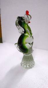 Vintage art glass dog on a pedestal and a clown
