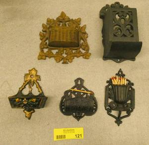 Group of 5 vintage cast iron matchstick holders