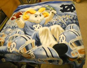 4 fleece throws - 3 Notre Dame and 1 winter