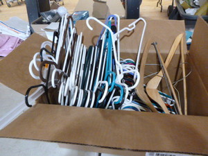 lot 71 image: Box Full of Plastic Hangers