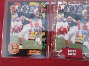 100. 2 Brett Favre Rookie Cards...