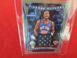 171. 2004 SP Dikembe Mutombo Jersey...
