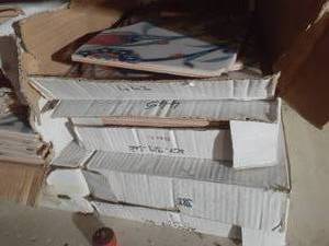 Lot of decorative tile - buyer will need to remove from basement