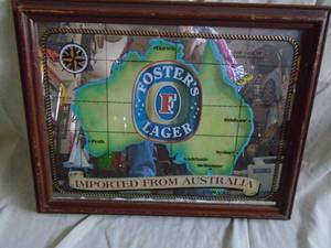 Fosters Lager wood framed mirror. 18 x 14. As shown.