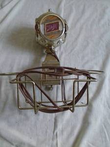 Shlitz lighted napkincondiment holder. Metal frame. 10 x 10. Works. As shown.