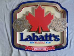 Labatts plastic sign with raised center section. 15 x 14. As shown.
