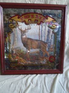 NOS Pigseye Buck wood framed mirror. 3rd in series. 18 x 19. Opened cardboard for pictures. As shown.