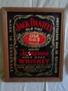 Jack Daniels wood framed mirror. 18 x 22. As shown.