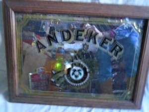 Andeker wood framed mirror. 22 x 16. Foil pulling away in a few spots. As shown.