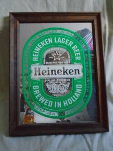 Heineken wood framed mirror. 10 x 13. As shown.