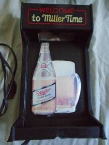 Miller High Life lighted sign. 8 x 13 x 5. Works. As shown.