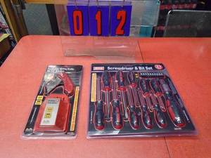 New screwdriver bit set & utility knife set. As shown.