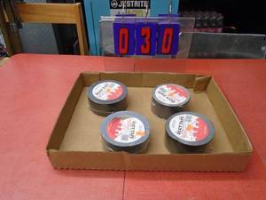 Flat of 4 rolls of duct tape. As shown.