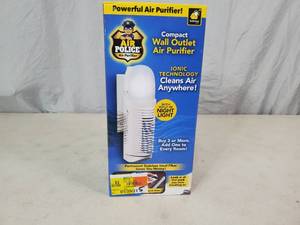 lot 72 image: New Air Police Compact Wall Outlet Air Purifier
