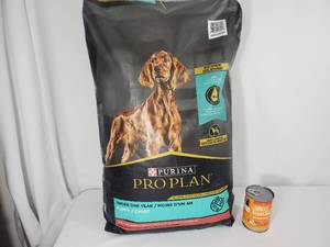 lot 5A image: New 24 lb Bag of Pro Plan Puppy Chow and Can Dog Food