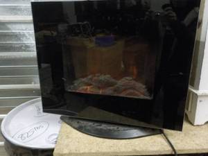 lot 79 image: Tabletop Electric Fireplace 26 x 22...