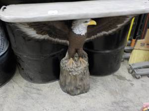 lot 80 image: Eagle Console Table- top is damaged...