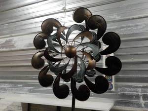 lot 87 image: Metal Spinner 82 tall- needs 1 lea...