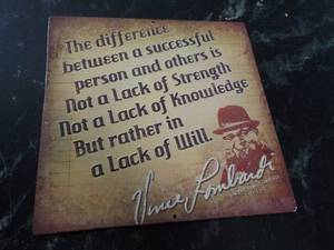 lot 48 image: Vince Lombardi Metal Sign 12 x 12...