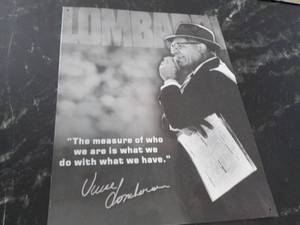 lot 50 image: Vince Lombardi Metal Sign 12 x 16...