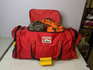 lot 51 image: Marlboro Adventure Team Gym Bag Filled With Cold Weather Hunting Gear - B