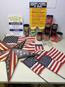 lot 286 image: All the Packers, Huskers, and America Fans US Flags, PackersHuskers Reusable Cups and More - N