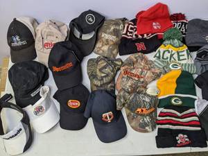 lot 281 image: Swedish Tapestry and 25 Baseball CapsBeanies Packers, Carhartt, Huskers, Jag, Etc. - N