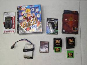 lot 343 image: Video Games Diablo 3, Pitfall 2 for Atari, Buzz Quiz TV for PS3, and More - N