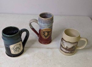 lot 151 image: Set of 3 Handcrafted Ceramic Mugs Terry Redlin and Others - N