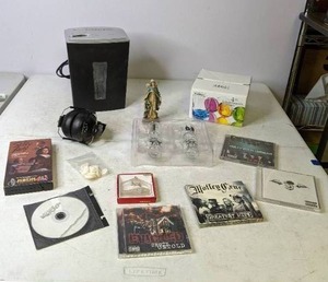 lot 306 image: Mixed Lot Paper Shredder, Motley Crew CD, Walkers Ear Muffs, Boondocks Saints Shot Glasses, and More - N